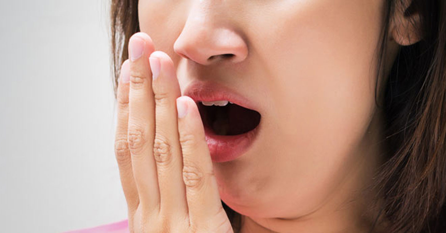 What causes bad breath and how can we cure this?